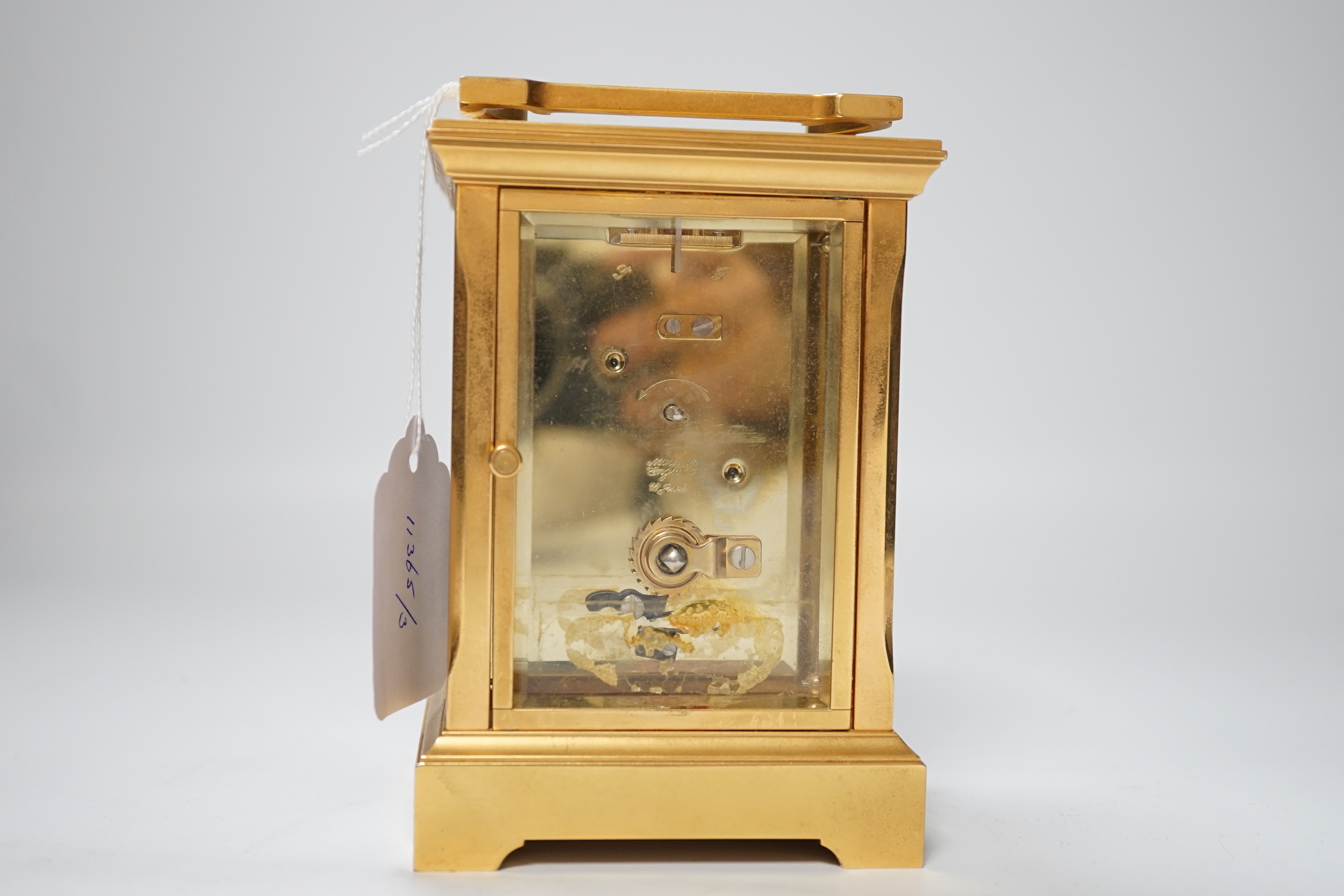 A carriage timepiece, signed Garrard and Co. to the face and stamped ‘Made in England’, 13.5cm